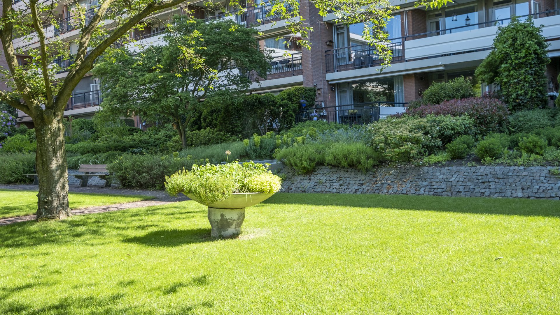 Tuin talud Recidence Loohorst gezamenlijke binnentuin appartementencomplex